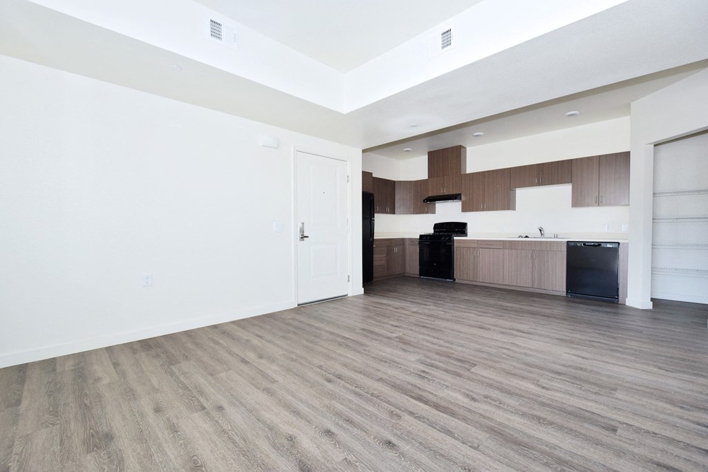 a kitchen and living room in a 555 waverly unit