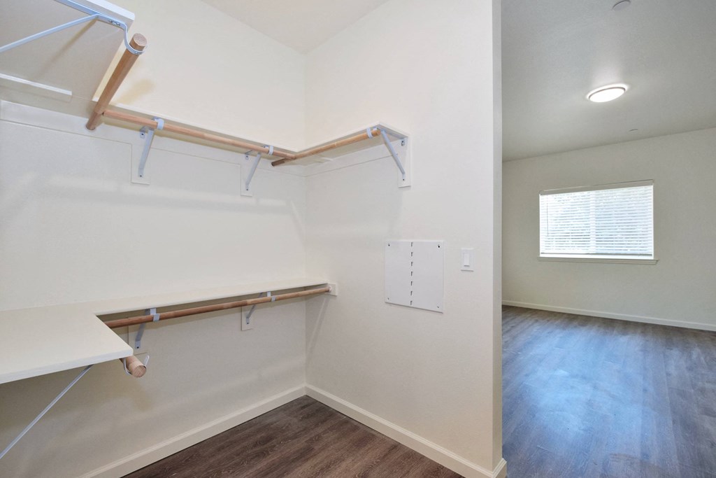 a walk in closet in a 555 waverly unit