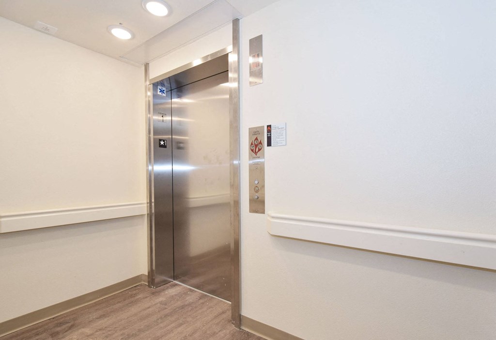 a view of the elevator from the inside of the building