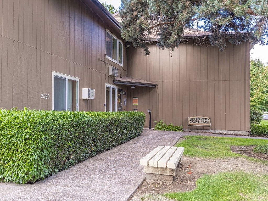 a building with a bench in front of it