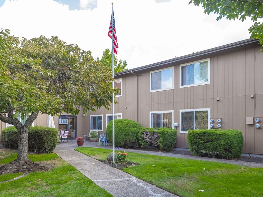 a building with an flag in front of it
