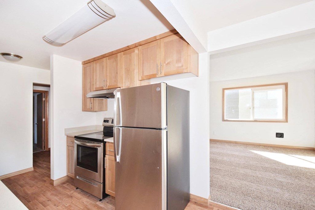 a kitchen and living room in a 555 waverly unit