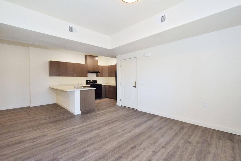 a kitchen and living room in a 555 waverly unit