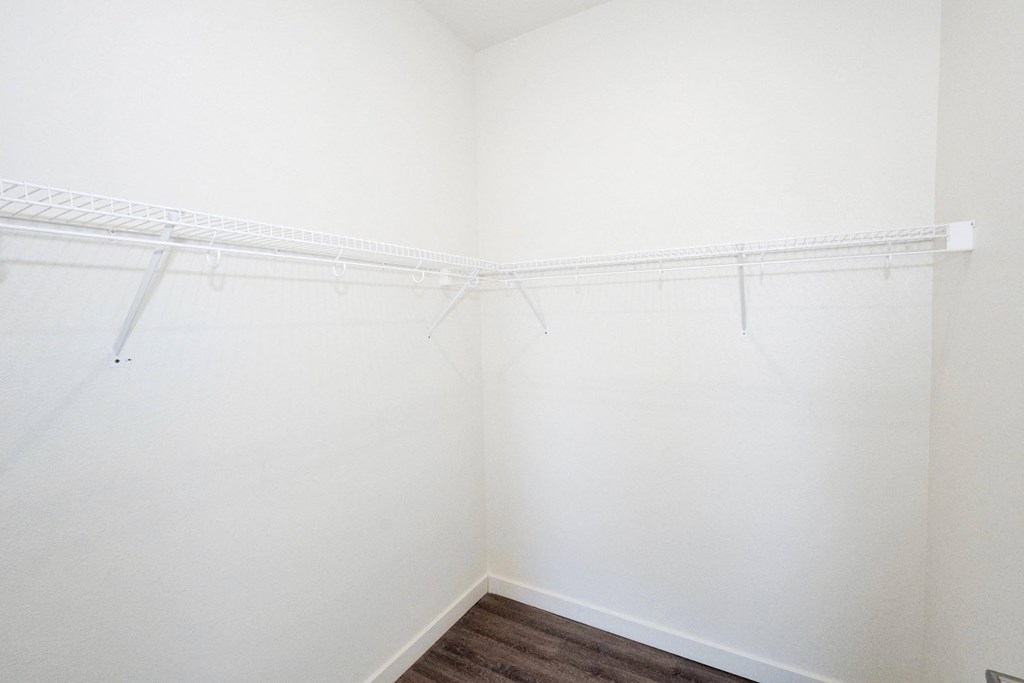 a walk in closet in a 555 waverly unit