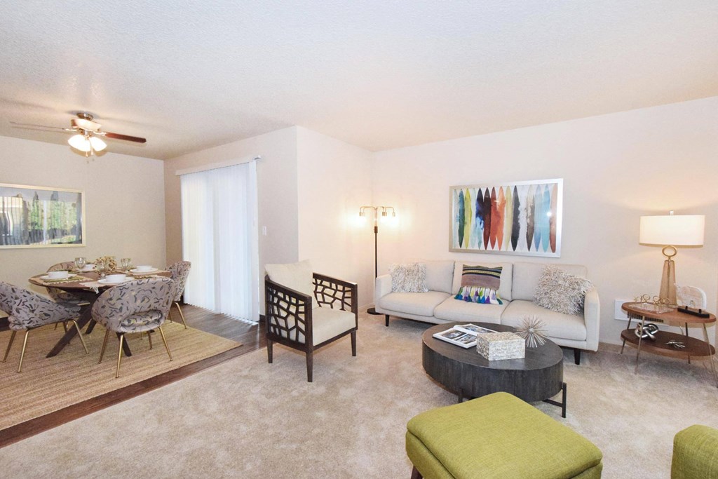 a living room with a couch and a chair