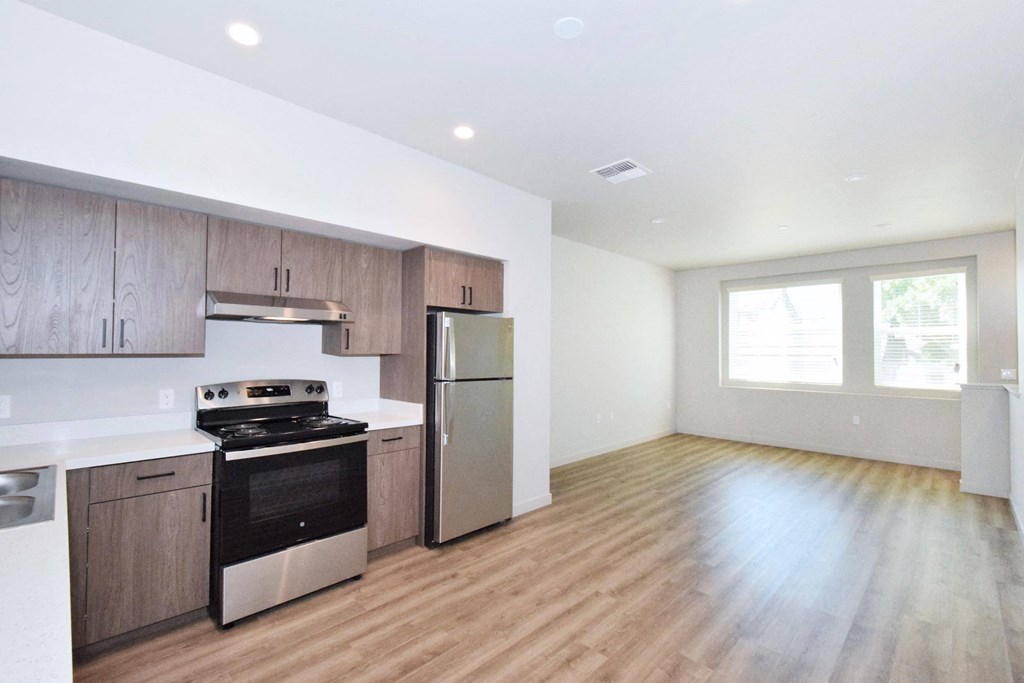 a kitchen and living room in a 555 waverly unit