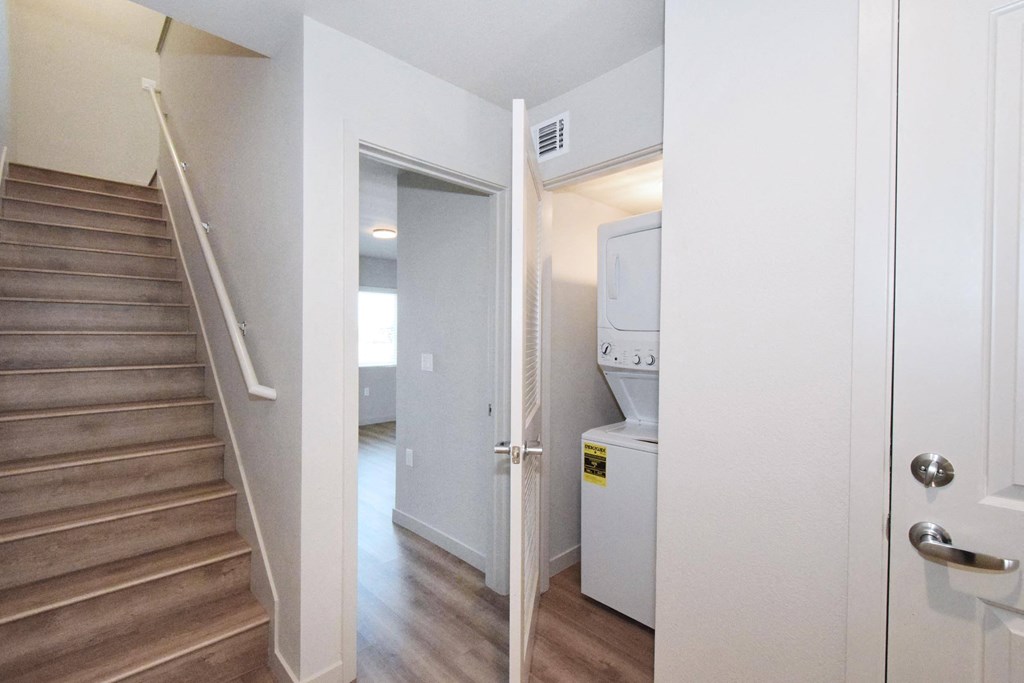 a small laundry room with a washer and dryer
