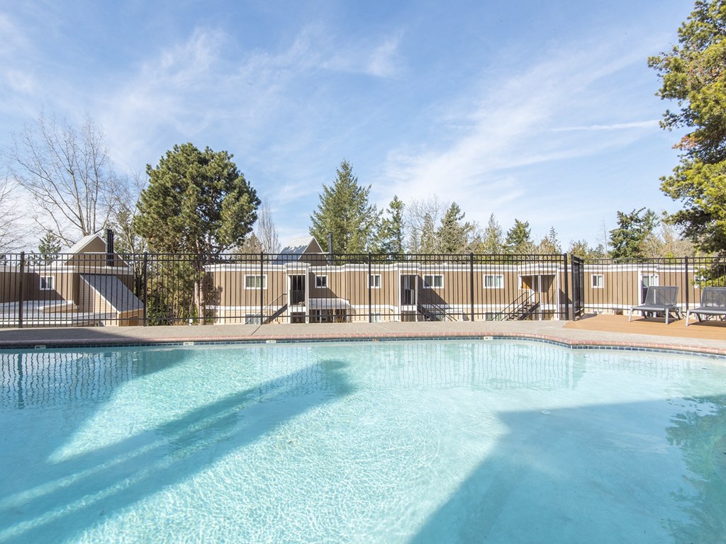 the swimming pool at woodland park apartments