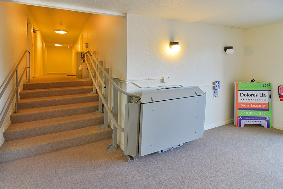 Dolores Lia, lift going up stairs