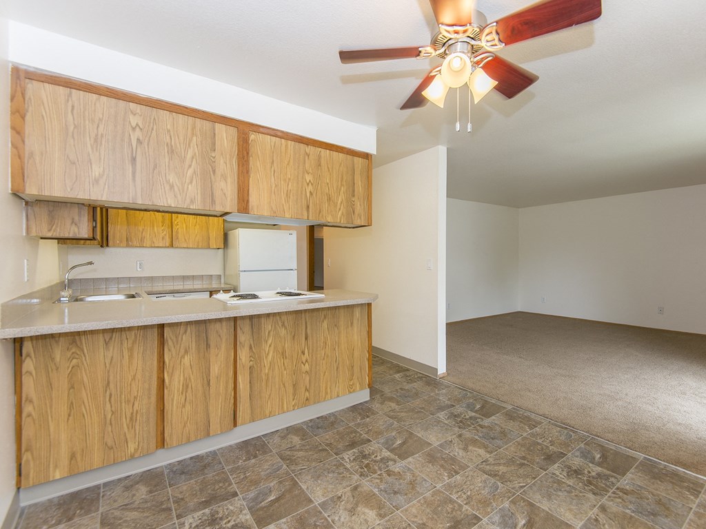 Willow Creek:  a kitchen and living room with a ceiling fan