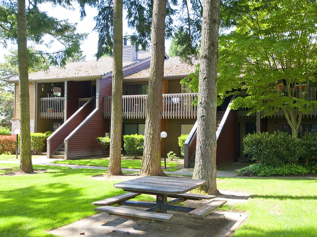 Stone Creek a picnic table in front of an apartment building
