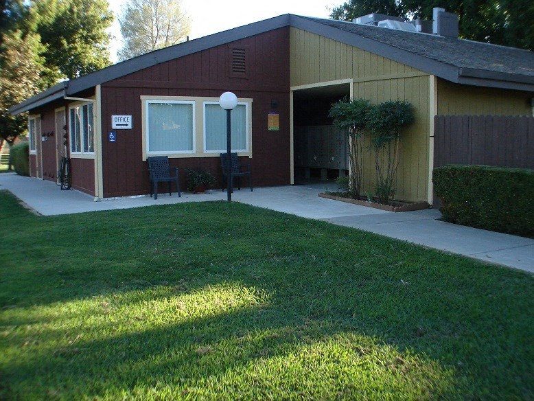 a home with a lawn in front of it