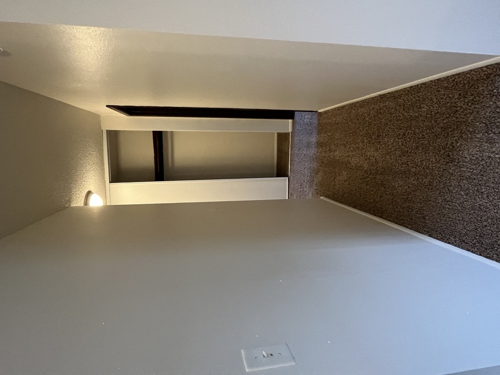 a room with a table and a window