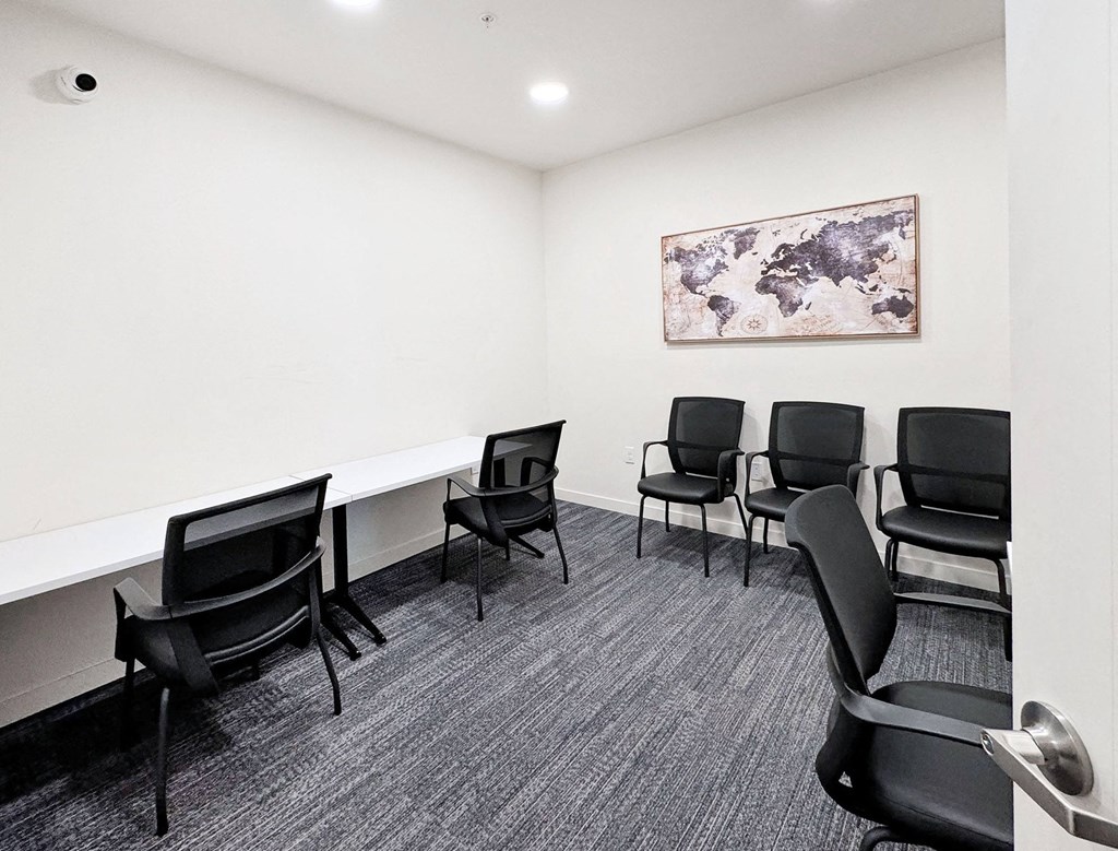 a conference room with chairs and a table