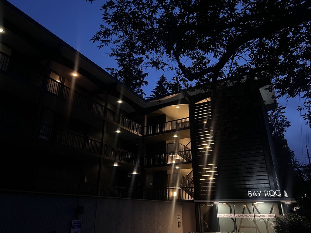 a night view of the exterior of bay roo building