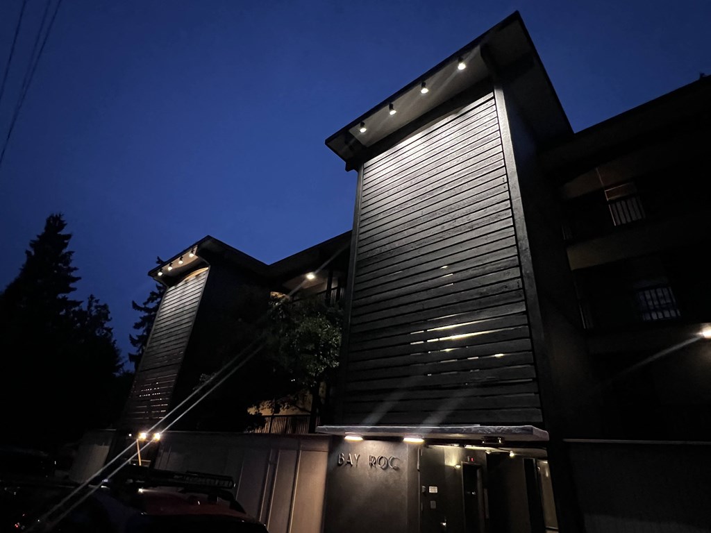 the building where the hotel is located is lit up at night