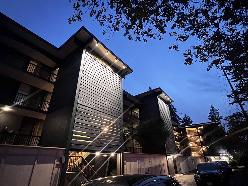 the building where the hotel is located is lit up at night