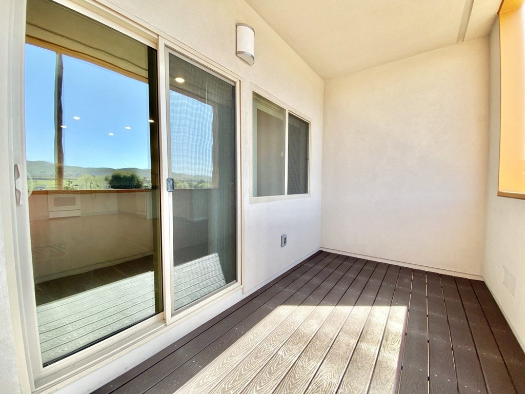 Willow View balcony looking towards the large sliding glass door into the apartment