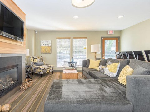 a living room with a couch and a television
