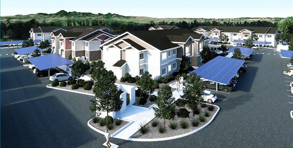 an aerial view of a neighborhood with houses with solar panels