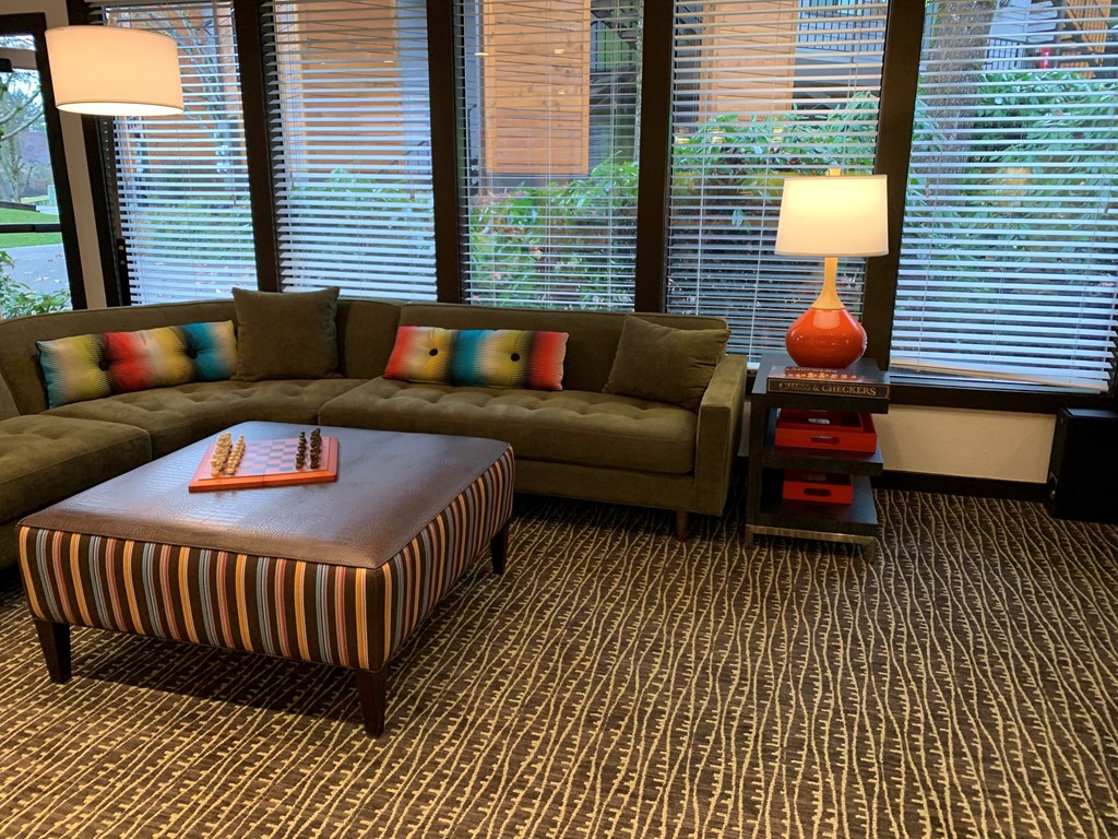 a living room with a couch and a table