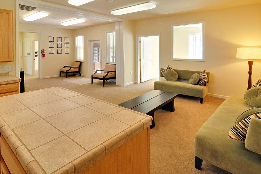 a living room with a couch and a table