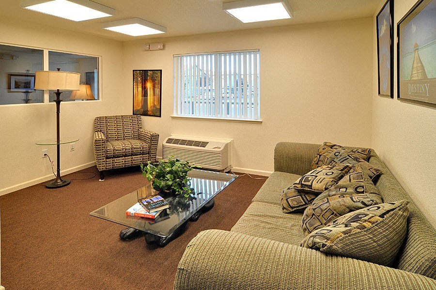 a living room with a couch and a coffee table
