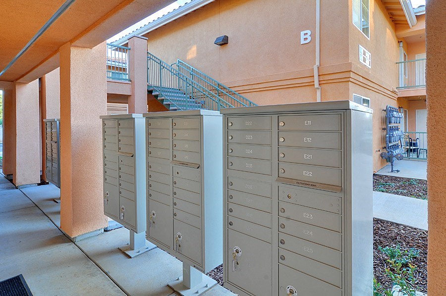 a row of mailboxes in front of a building