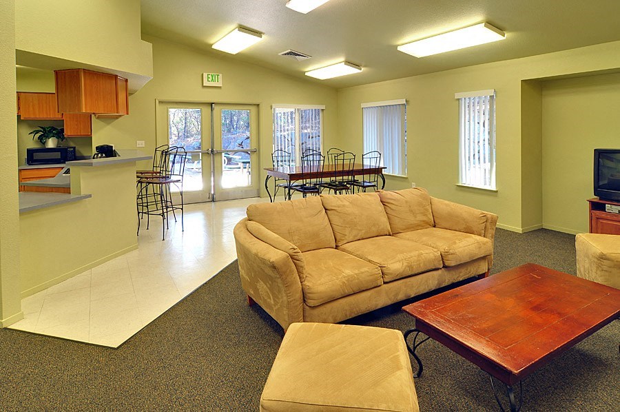 a living room with a couch and a coffee table