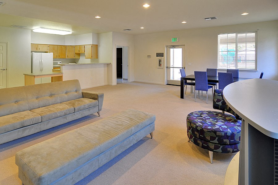 a living room with a couch and a table
