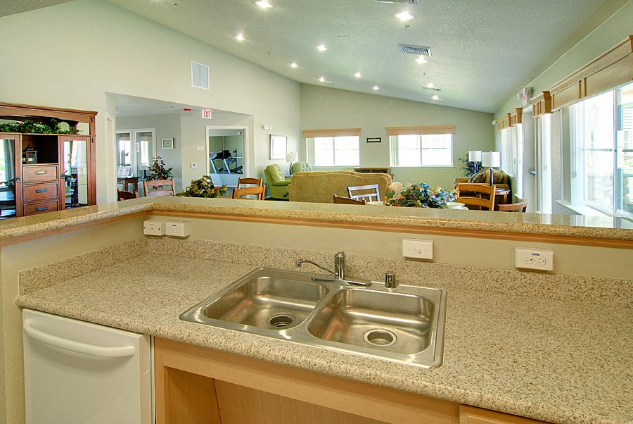 a kitchen with a sink and a counter top
