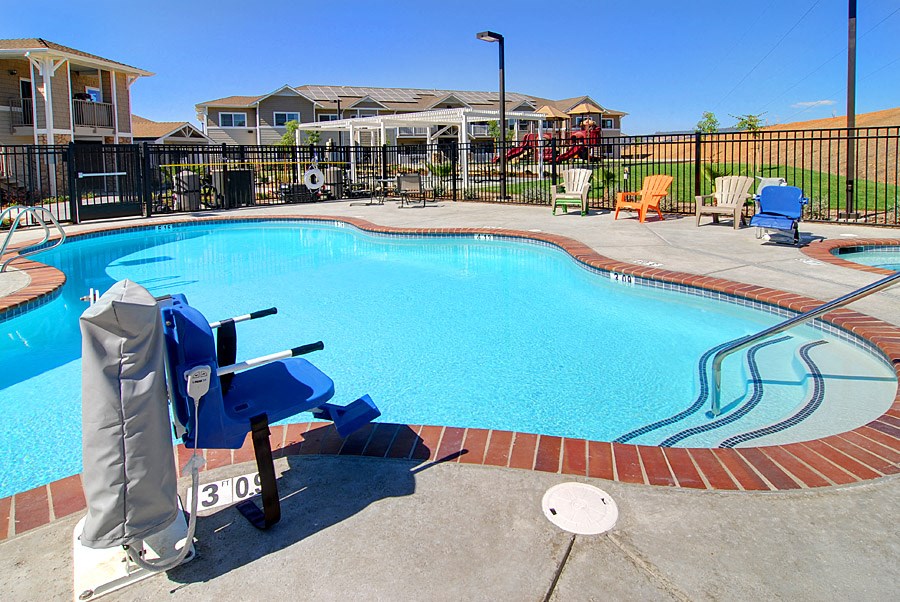 the swimming pool at villas on the creek apartments