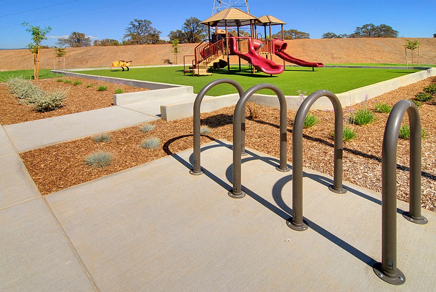 a playground at a park with a slide