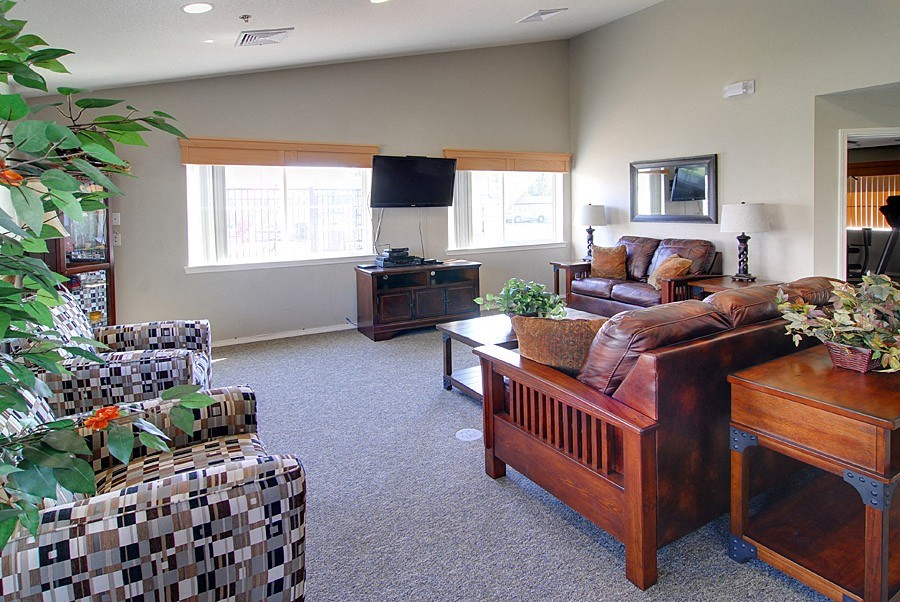 a living room with a couch and a table