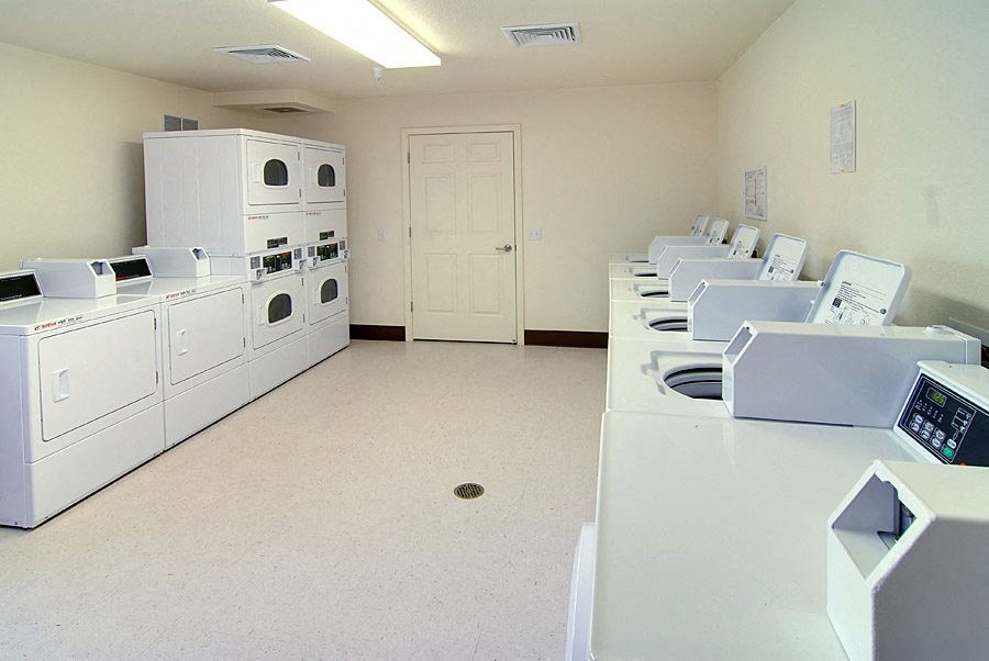 a large room with many white appliances in it