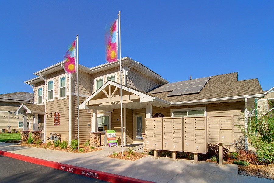 a house with two flags in front of it