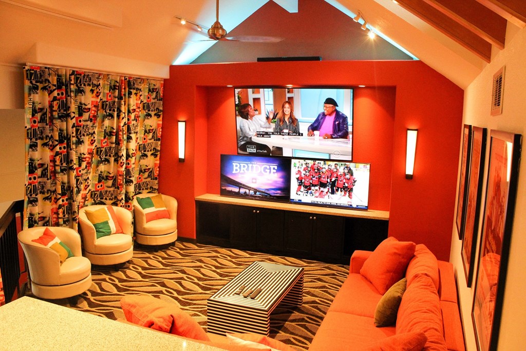 a living room with a couch and a tv