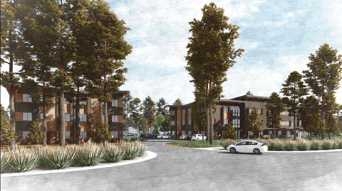 A white car is parked on a street in front of a building.