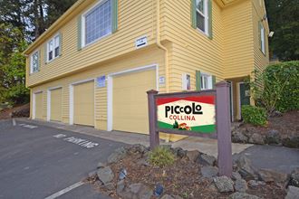 a building with a piccolo colina sign in front of it