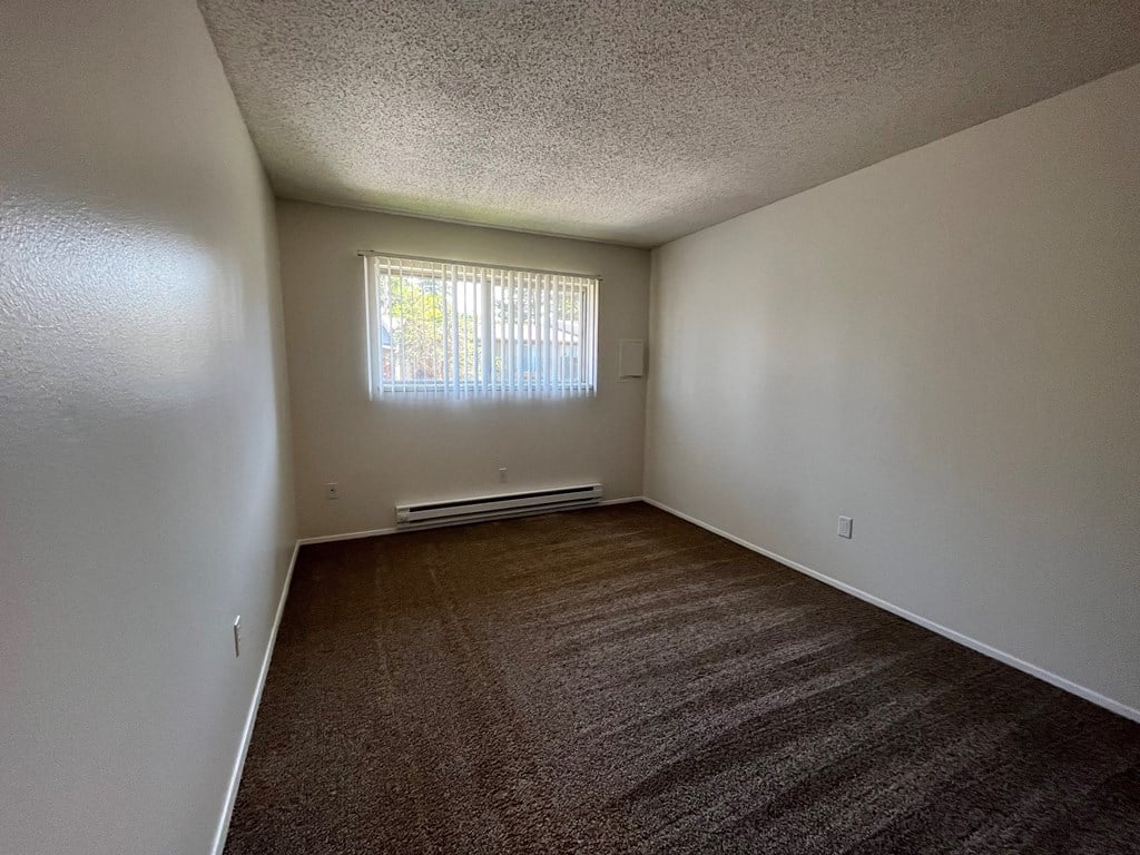 an empty room with a window