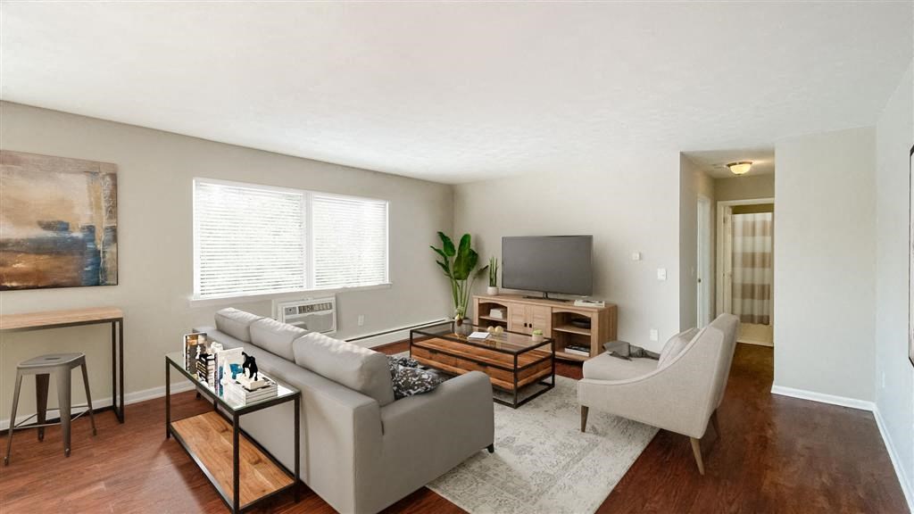 a living room with a couch and a television