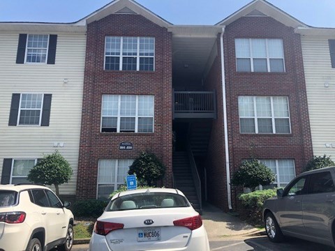 Three story apartment buildings.