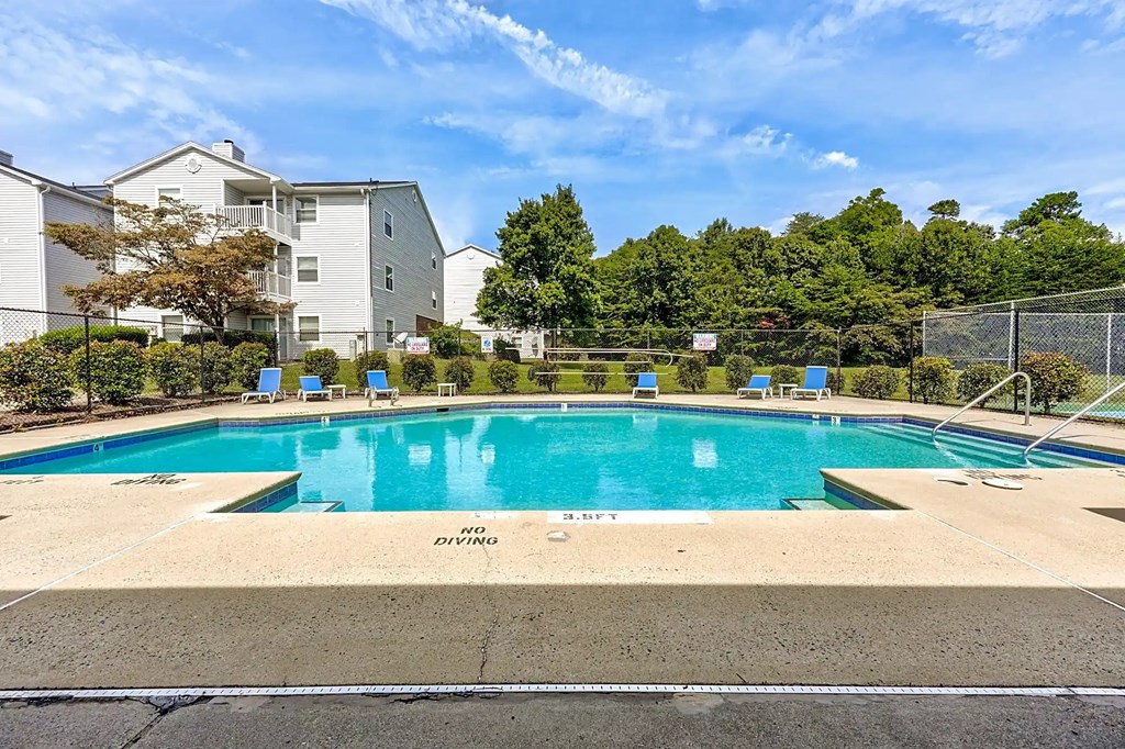 A swimming pool with the words A swimming pool with the words at Sedgefield Square Apartments, Greensboro, 27407