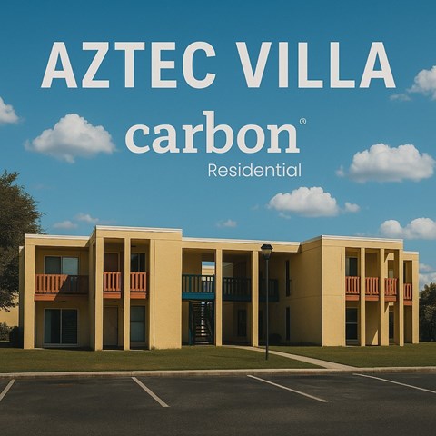 A building with the text "AZTEC VILLA carbon Residential" in front of it.