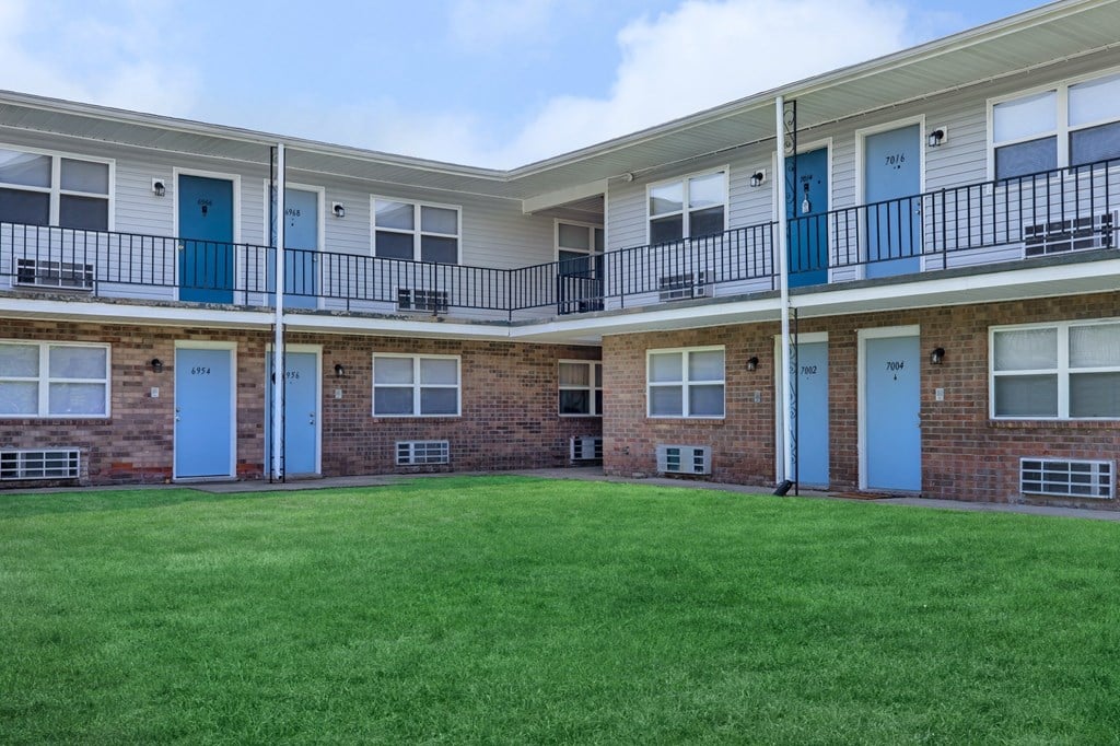 our apartments have a large green yard and balconies