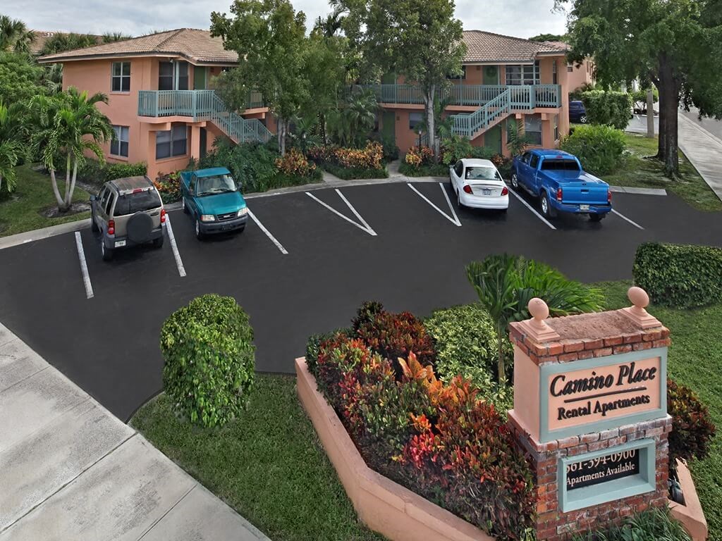 a rendering of a parking lot with cars in it