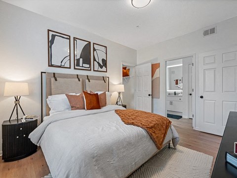 Spacious bedroom with furniture
