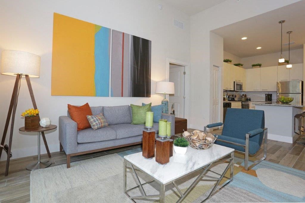 a living room with a couch and a table