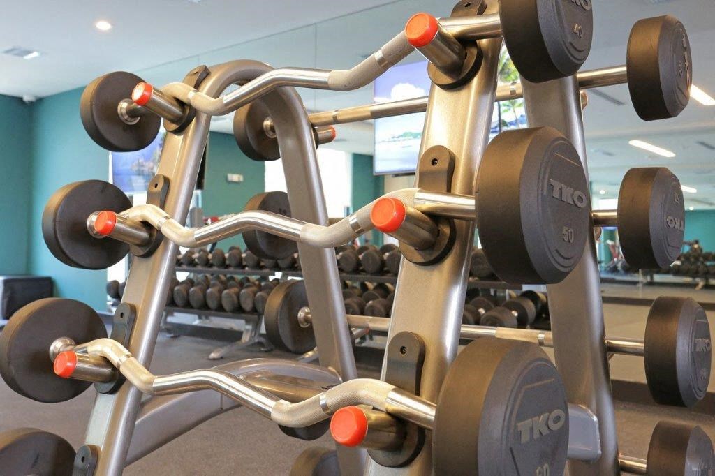 a row of weights in a gym