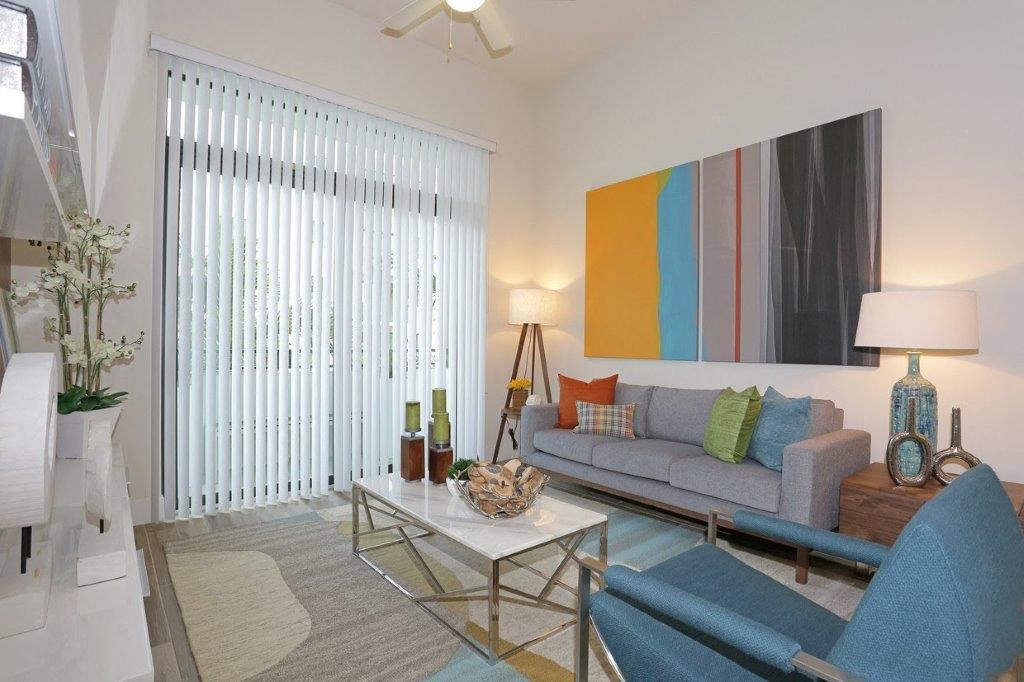 a living room with a couch and a table